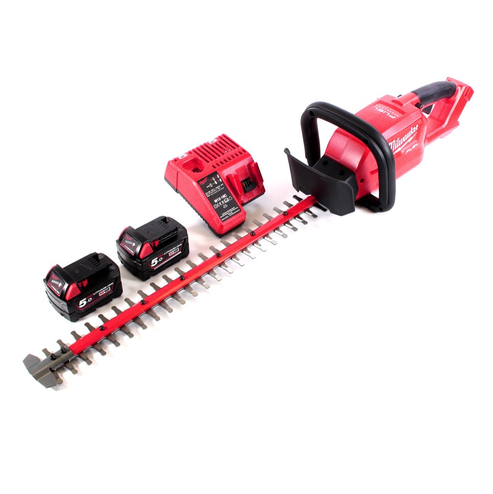 Taille-haie à batterie Milwaukee M18 CHT-502C 18 V 610 mm sans balais + 2x batteries 5,0 Ah + chargeur