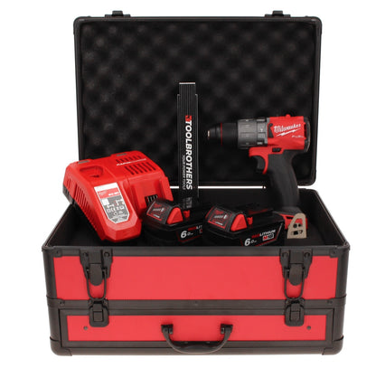 Milwaukee M18 FPD2-602FC TX Akku Schlagbohrschrauber 18 V 135 Nm Brushless + 2x Akku 6,0 Ah + Ladegerät + Gliedermaßstab + TX Koffer